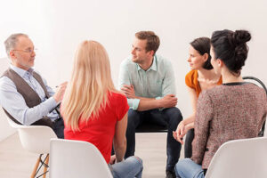 group therapy session in an opioid addiction treatment program