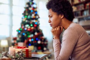 A woman thinking about anxiety and the holidays