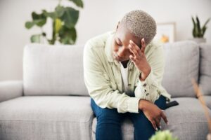 A person experiencing opioid withdrawal symptoms