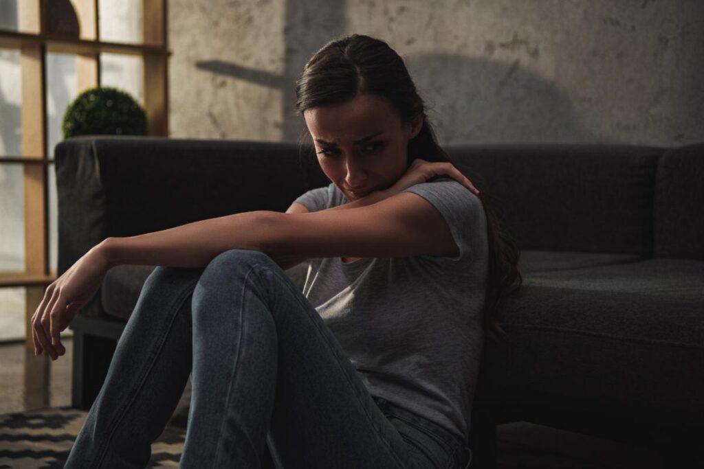 Woman pondering the long term effects of heroin