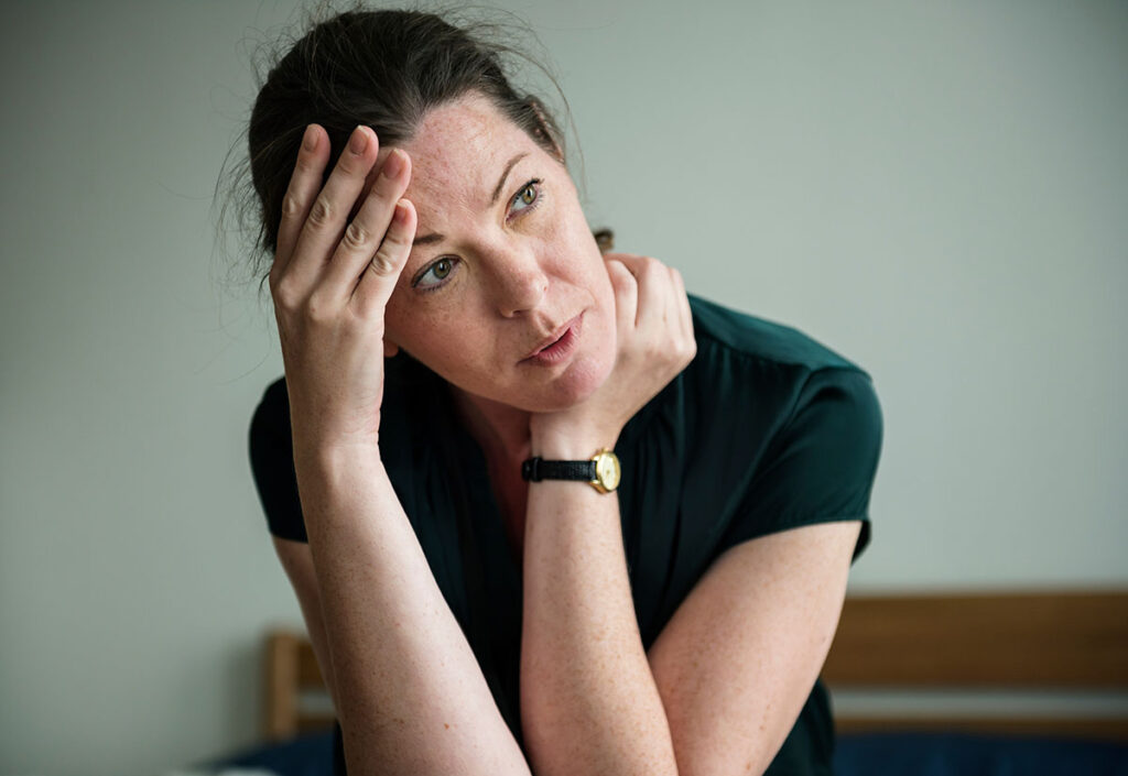 A woman wondering, "Is heroin an opioid?"
