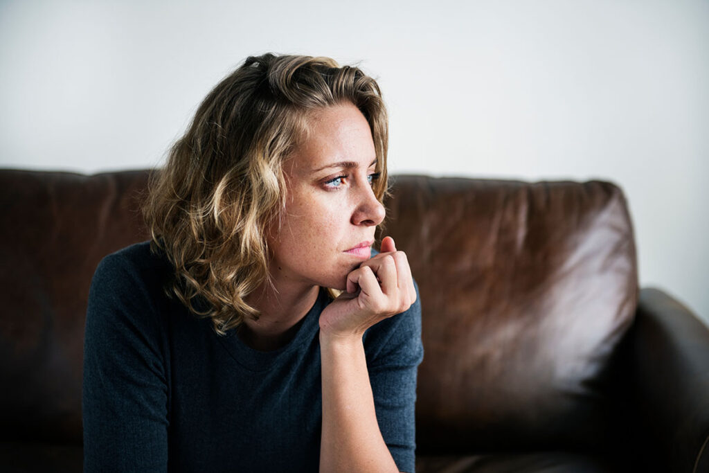 A woman thinking about her oxycodone abuse