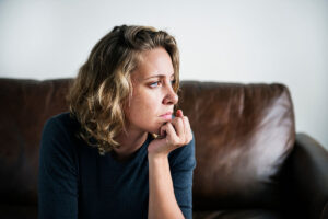 A woman thinking about her oxycodone abuse