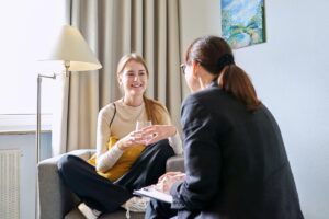 A woman asking, "How does neurofeedback work?"