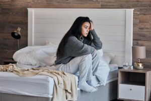 A woman thinking about how to reduce morning anxiety