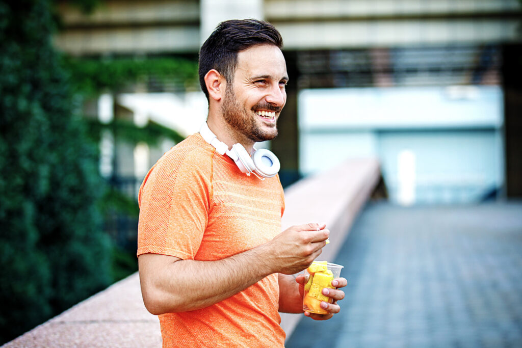 Man smiling after figuring out how to live better.