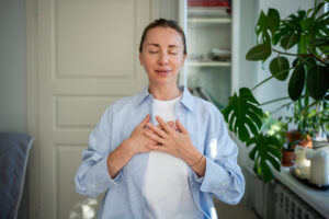 Woman talking a deep breath after asking what does relapse prevention entail.